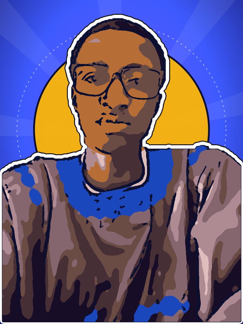 Portrait of Souleymane DIAW wearing a grey boubou with royal-blue embroidery